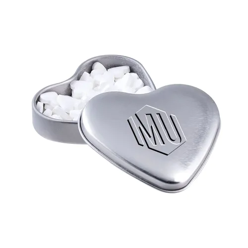 Heart shaped tin with embossing and filled with peppermint Heart shaped tin with embossing and filled with peppermint
