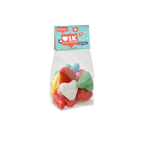 Block bottom bag with header card and 100 grams of sweets Block bottom bag with header card and 100 grams of sweets