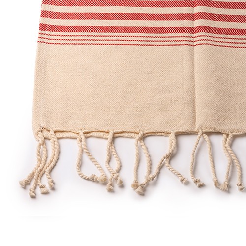 Asciugamano pareo con frange decorative annodate. Osório