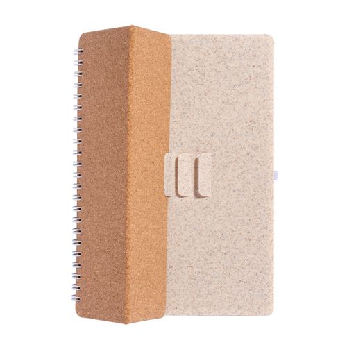 Carnet à anneaux en liège transformable en support pour téléphone portable.