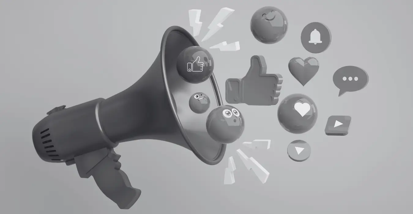 Social Media Ads vs. Giveaways 3D-Illustration eines Megafons, aus dem Social-Media-Icons (Likes, Herzen) strömen, Symbolbild für digitale Reichweite im Vergleich zur Wirkung eines physischen Giveaway.