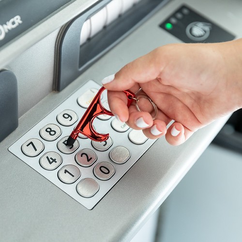 Otwieracz z uchwytem na klucz