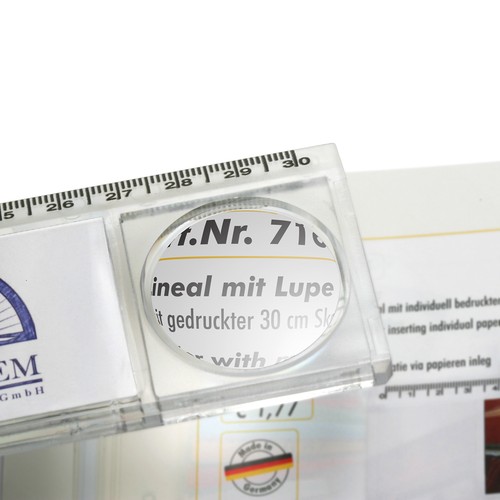 Ruler with magnifier