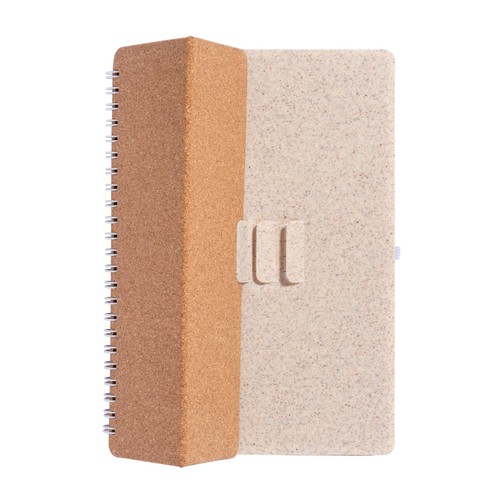 Carnet à anneaux en liège transformable en support pour téléphone portable.