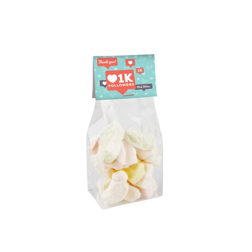 Block bottom bag with header card and 100 grams of sweets