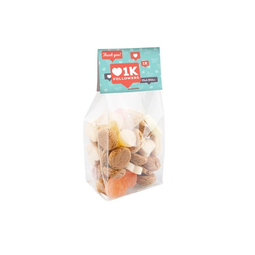 Block bottom bag with header card and 100 grams of sweets