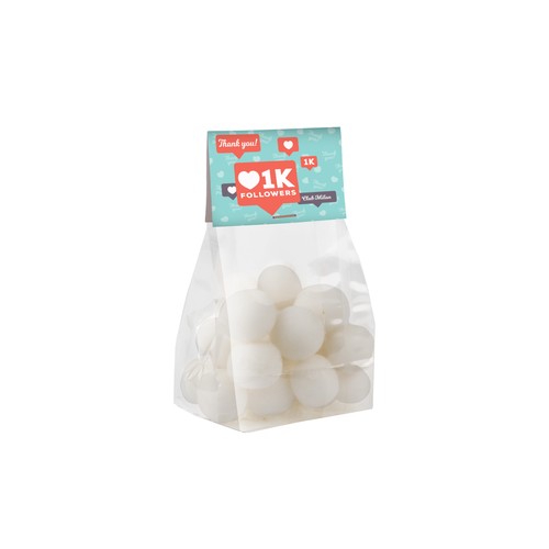 Block bottom bag with header card and 100 grams of sweets Block bottom bag with header card and 100 grams of sweets