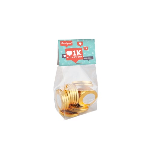 Block bottom bag with header card and 100 grams of sweets Block bottom bag with header card and 100 grams of sweets