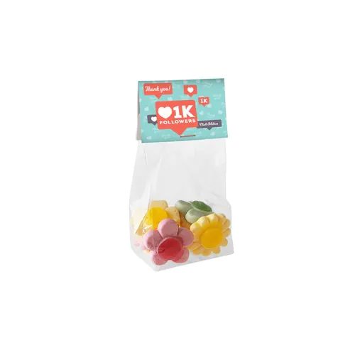 Block bottom bag with header card and 50 grams of sweets Block bottom bag with header card and 50 grams of sweets