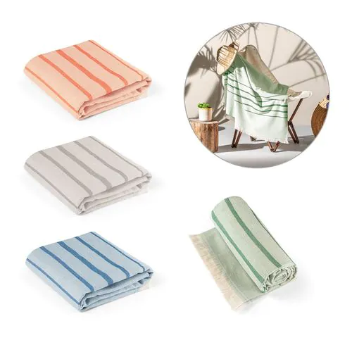 CAPLAN. Multifunctional towel made of light and resistant cotton (90%) and recycled cotton (10%) CAPLAN. Multifunctional towel made of light and resistant cotton (90%) and recycled cotton (10%)