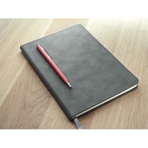 Magnetic notebook with a pen