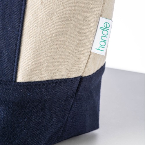 Mini shopper bag made of 340 g/m2 recycled cotton with colorful handles and base. GRS