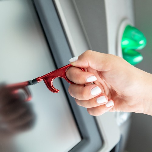 Otwieracz z uchwytem na klucz