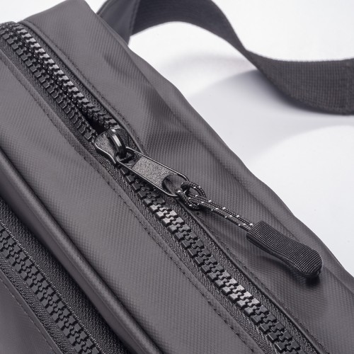 Water resistant polyester waistbag. Front pocket with zipper and adjustable belt