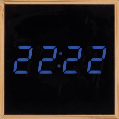 Desk clock with black display and blue LED display