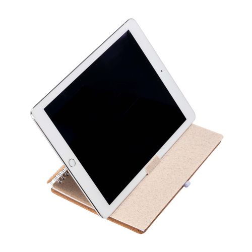 Carnet à anneaux en liège transformable en support pour téléphone portable.