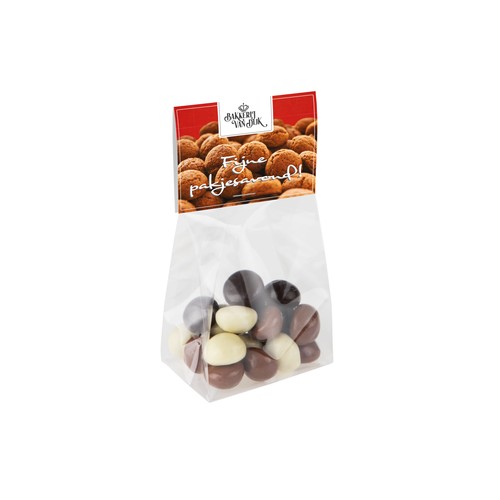 Block bottom bag with header card and 50 grams of sweets Block bottom bag with header card and 50 grams of sweets